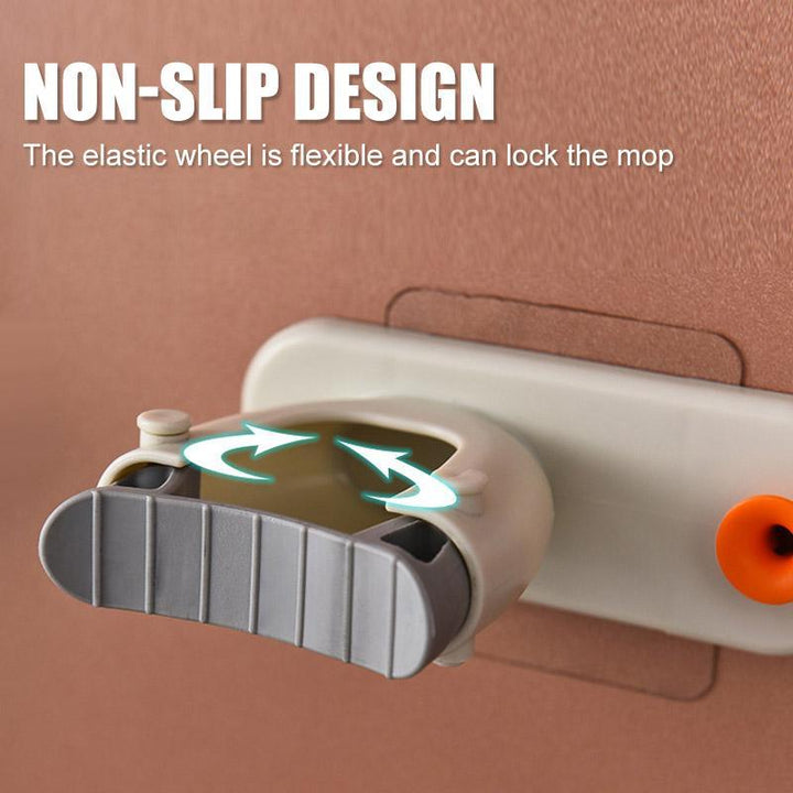 White 2-in-1 wall organizer for mops, brooms, and dustpans, enhances bathroom and kitchen space