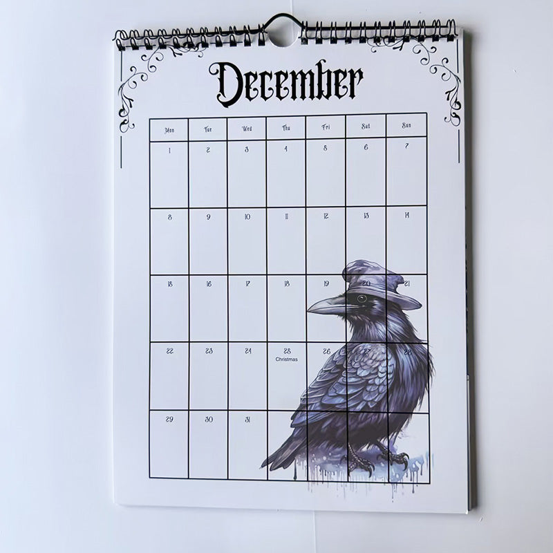 A hand flipping through the pages of the 2025 Gothic Castle Wall Calendar, revealing unique artwork.