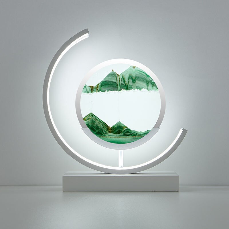 "3D Sand Shell Table Lamp emitting soothing green LED light; modern art-inspired design with dynamic sand patterns."