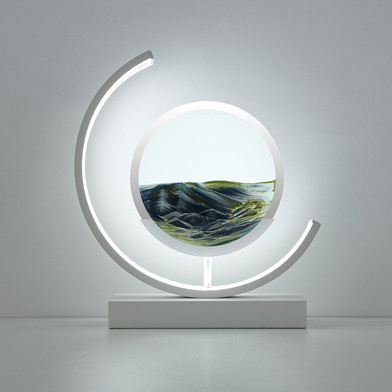"3D Sand Shell Table Lamp emitting soothing green LED light; modern art-inspired design with dynamic sand patterns."