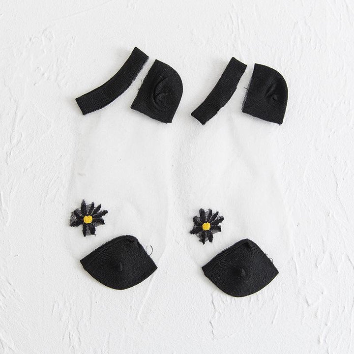 Assortment of women's breathable ankle socks with lovely daisy floral designs, gift-ready
