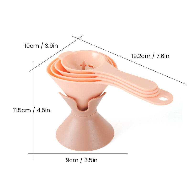 Kitchen helper: funnel set with liquid transfer in progress, showing no-spill design