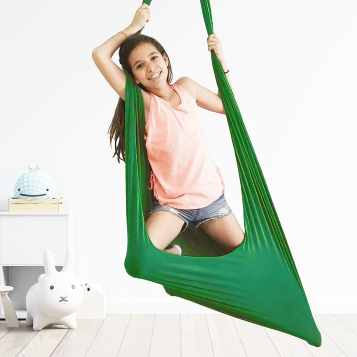 "Calming therapy hammock for children in soothing colors, enhances relaxation, emotional calmness, and motor skills."