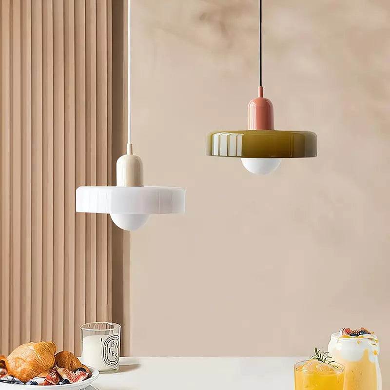 "Colourful glass pendant lamp in Bauhaus style featuring red, green, pink, and yellow stained glass for artistic decor."