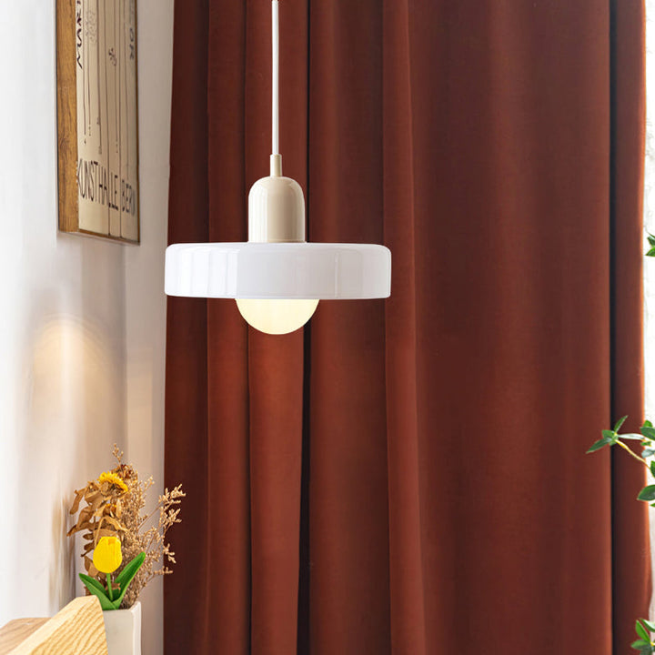 "Colourful glass pendant lamp in Bauhaus style featuring red, green, pink, and yellow stained glass for artistic decor."
