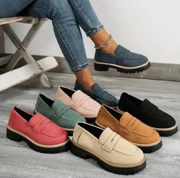 "Comfortable women's slip-on suede sandals showcasing soft suede texture and supportive sole for stylish all-day wear."