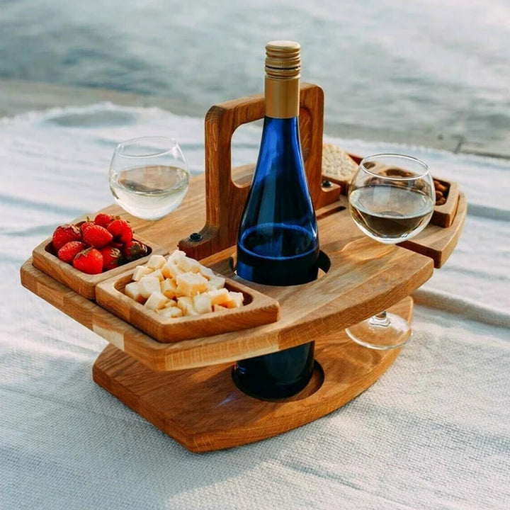 Compact wooden picnic wine table with compartments for snacks and wine, featuring a foldable, elegant design for outdoor gath