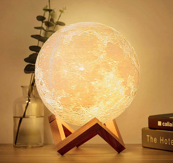 Cordless LED rechargeable table lamp with wooden stand and 16 color options, perfect for home decor and ambiance.