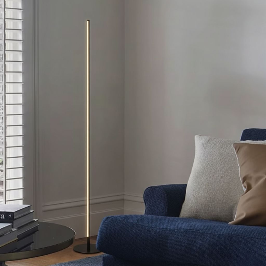Elegant LED floor lamp with adjustable soft glow, minimalist design in aluminum and acrylic, ideal for modern living rooms.