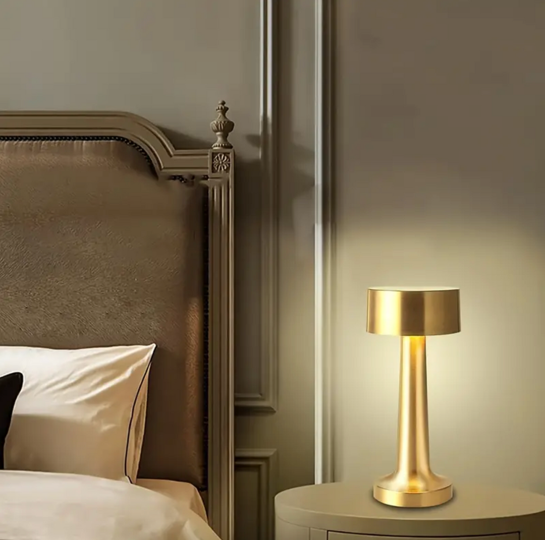 "Elegant cordless dimmable LED table lamp with touch control, ideal for living rooms and bedrooms in gold, rose gold, or silv