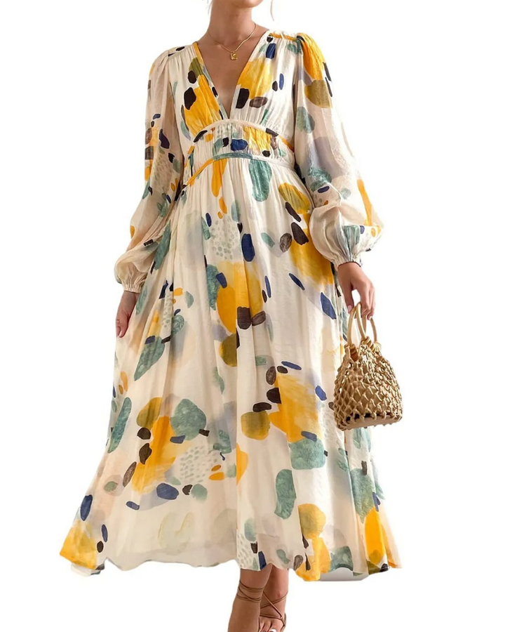 Elegant floral maxi dress with vibrant patterns, graceful flow, and versatile design for any formal occasion or event.