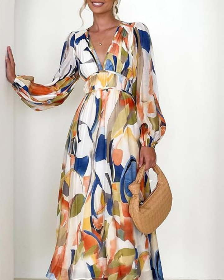Elegant floral maxi dress with vibrant patterns, graceful flow, and versatile design for any formal occasion or event.