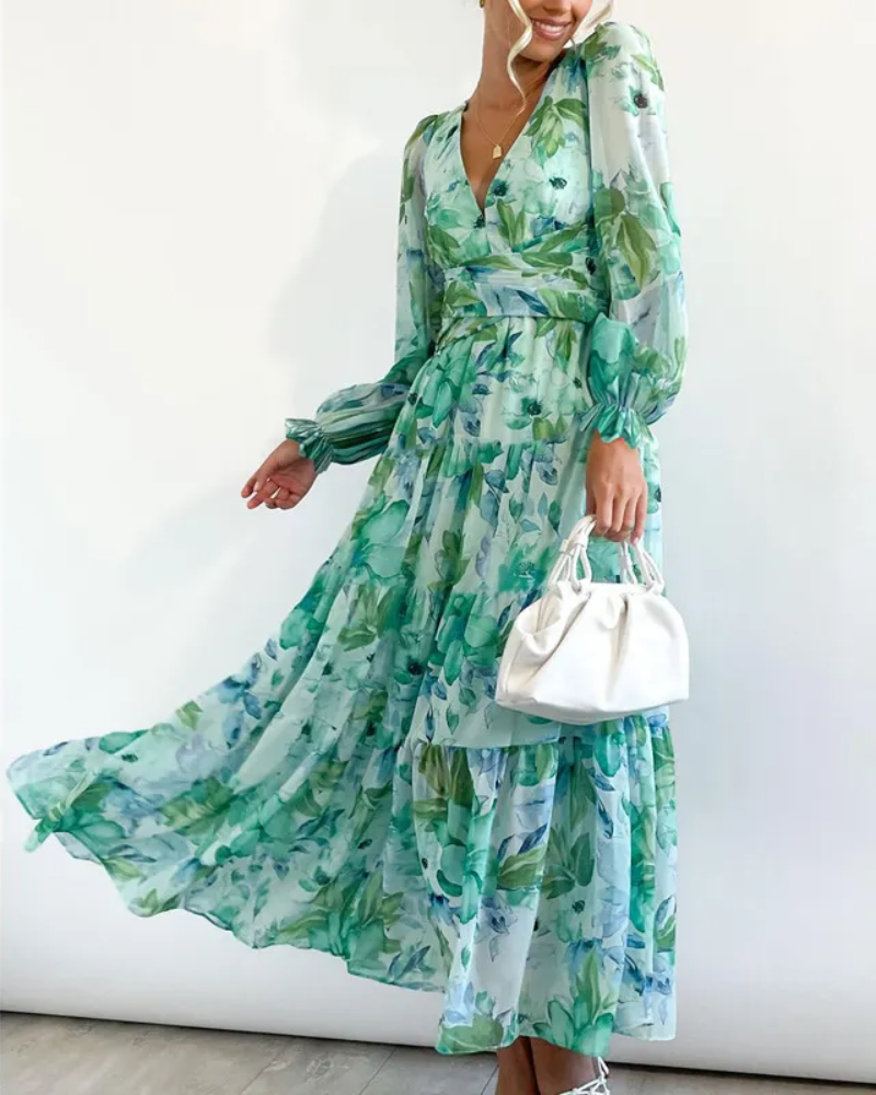 Elegant floral maxi dress with vibrant patterns, graceful flow, and versatile design for any formal occasion or event.