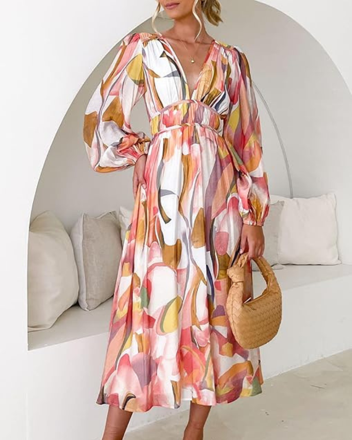 Elegant floral maxi dress with vibrant patterns, graceful flow, and versatile design for any formal occasion or event.