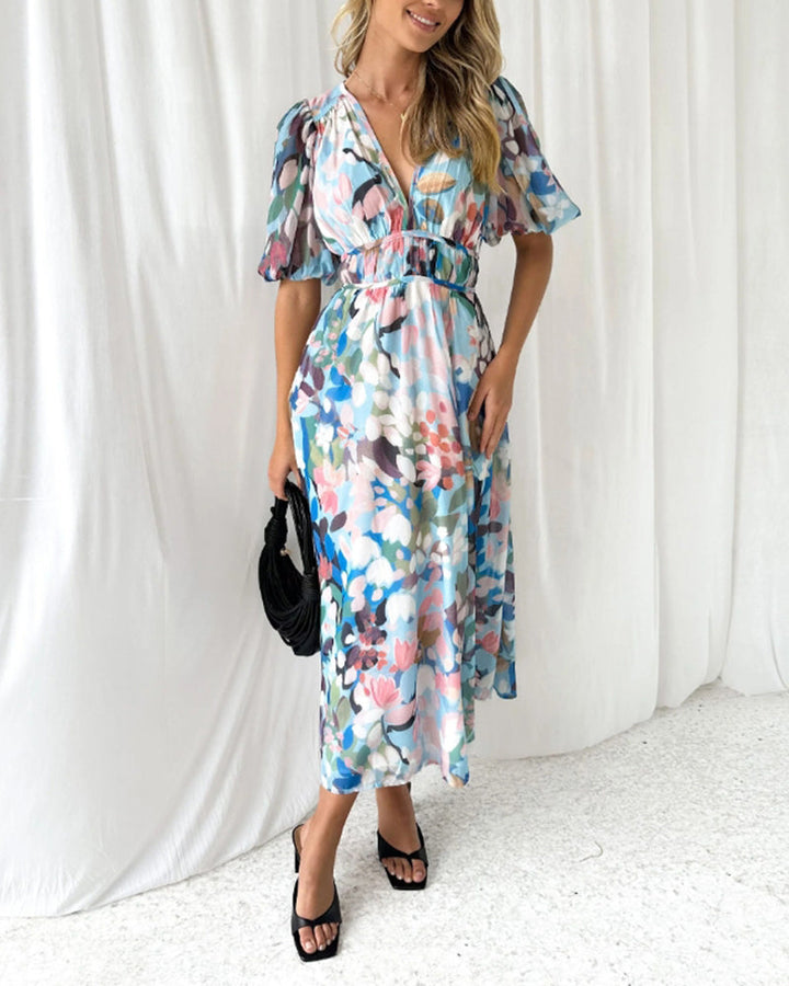 Elegant floral maxi dress with vibrant patterns, graceful flow, and versatile design for any formal occasion or event.