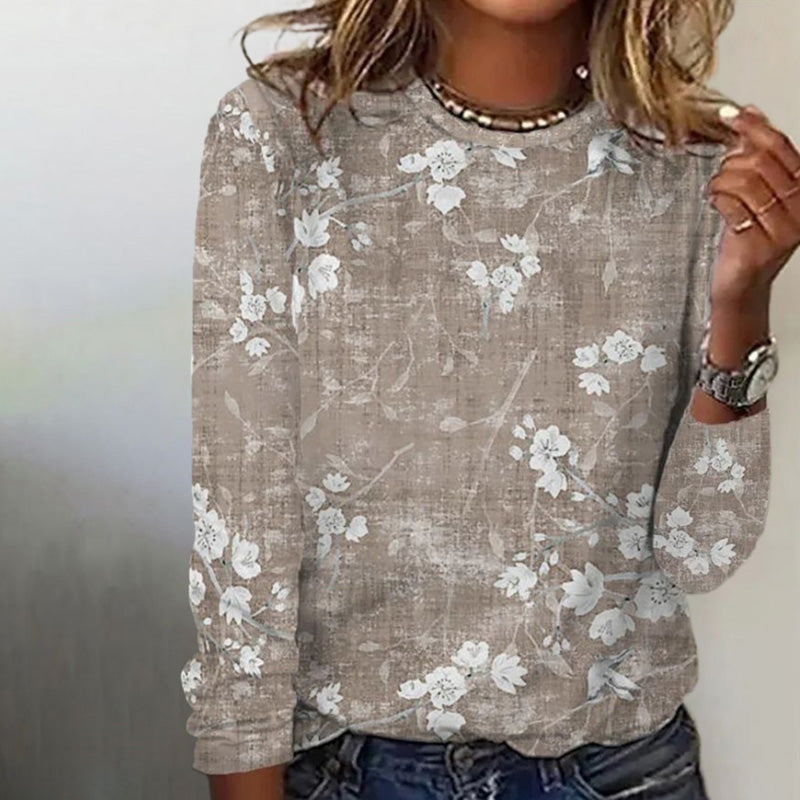 Elegant khaki women's floral print top with long sleeves, softly tailored for a relaxed, sophisticated look.