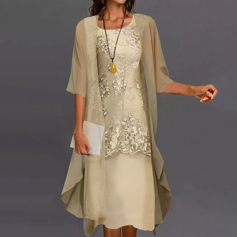 Elegant women's chiffon two-piece dress; flowing fabric, flattering fit, stylish design; front view.