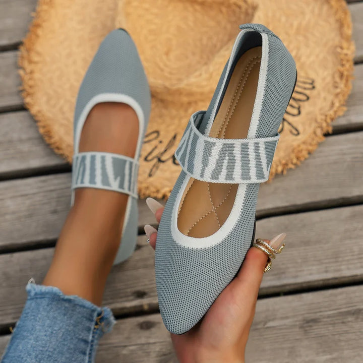 Elegant women's flat shoes with flexible support in versatile colors, designed for comfort and style in various settings.