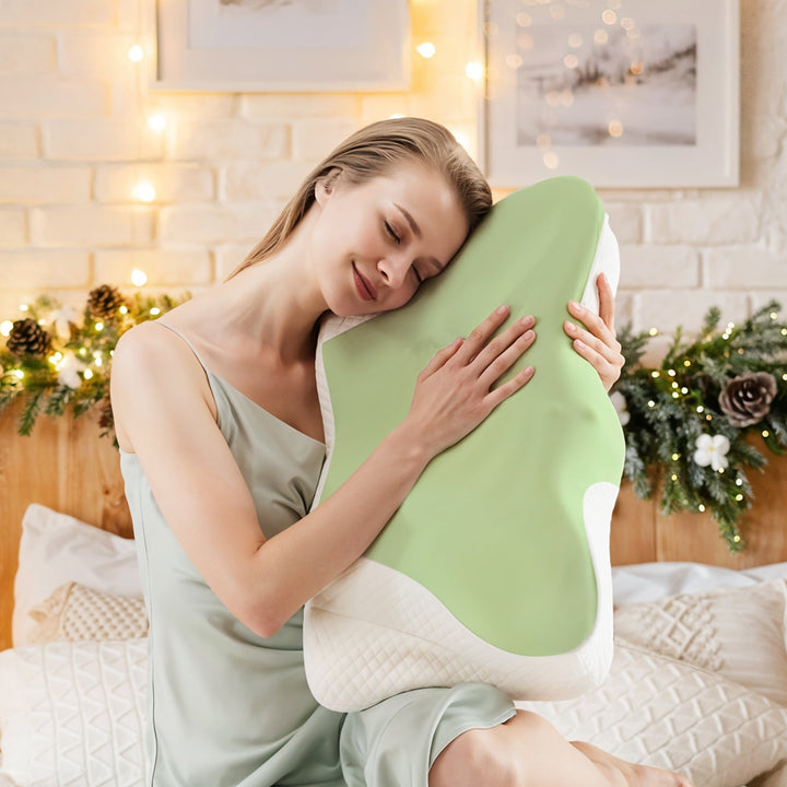 "Ergonomic butterfly-shaped memory foam pillow offering neck support, shown in stylish blue with breathable fabric design."