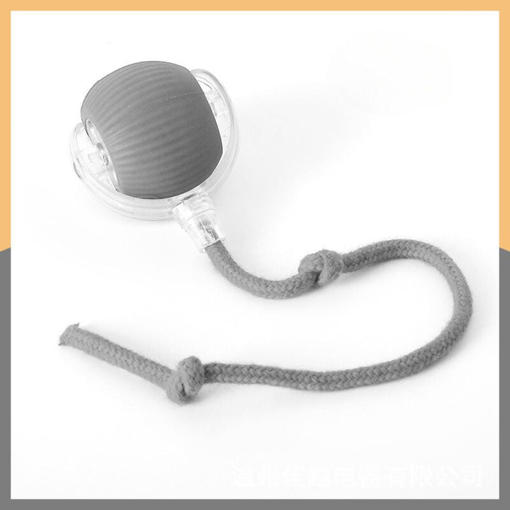 "Interactive cat toy ball with tail in green and grey, designed for active playtime and engaging feline hunting instincts."