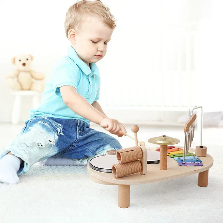 Kids wooden musical toy set with colorful xylophone, drums, and bells encourages creativity and exploration of rhythms.