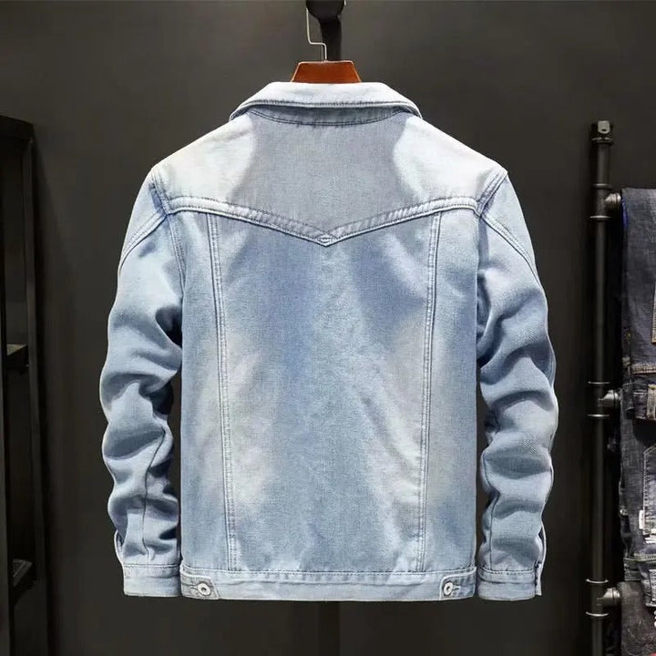 Men's denim jacket with fleece lining, displaying timeless style and warmth, ideal for winter outfits and casual occasions.