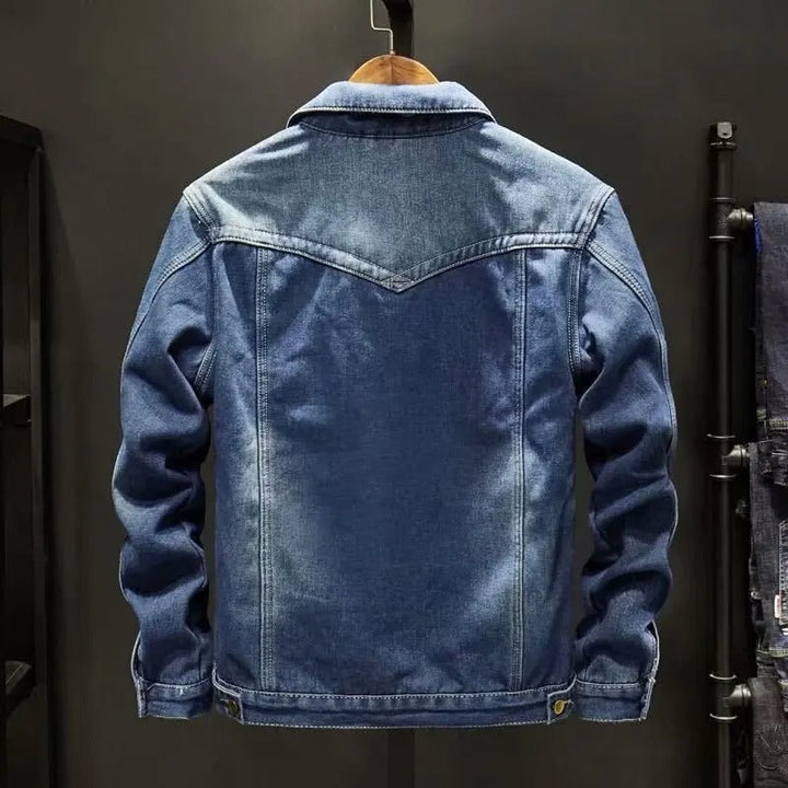 Men's denim jacket with fleece lining, displaying timeless style and warmth, ideal for winter outfits and casual occasions.