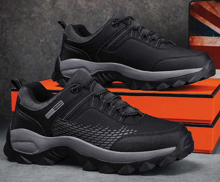 Men's flexible sole barefoot hiking shoes with lacing in a sleek, durable design for natural walking and outdoor adventures.