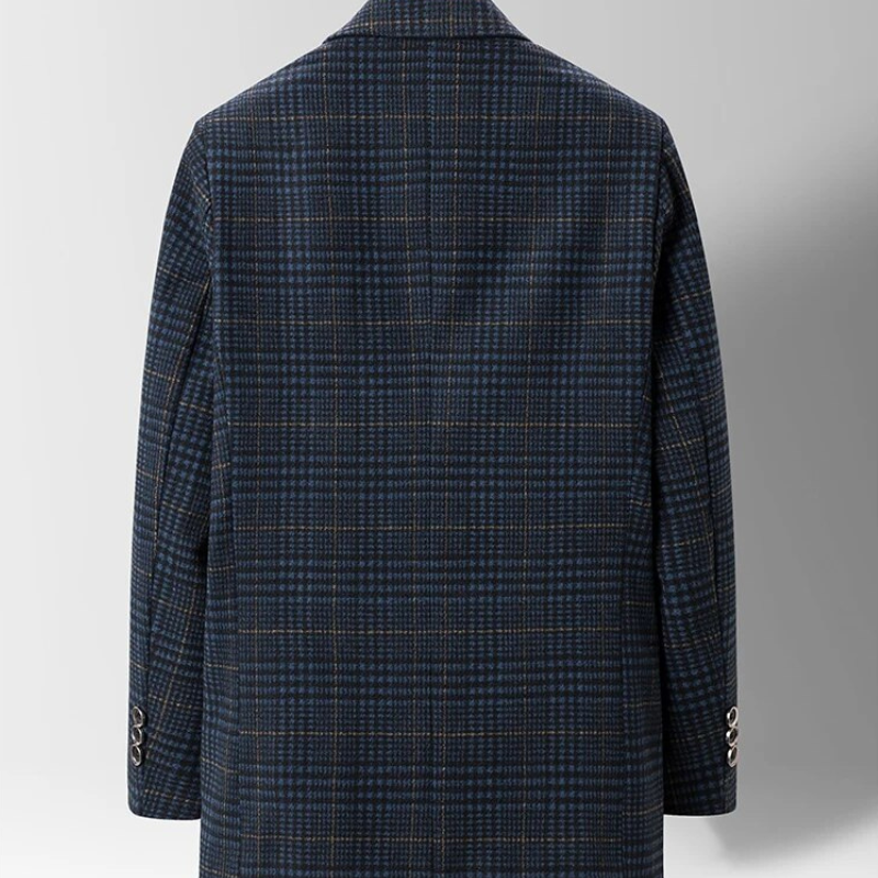 Men's tailored wool blazer with smooth cotton lining, showing elegant fit and dual pockets for stylish comfort.