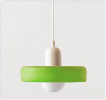 "Modern glass pendant light with sleek glass, brushed metal, ideal for elegant interiors, adds sophistication and warmth."
