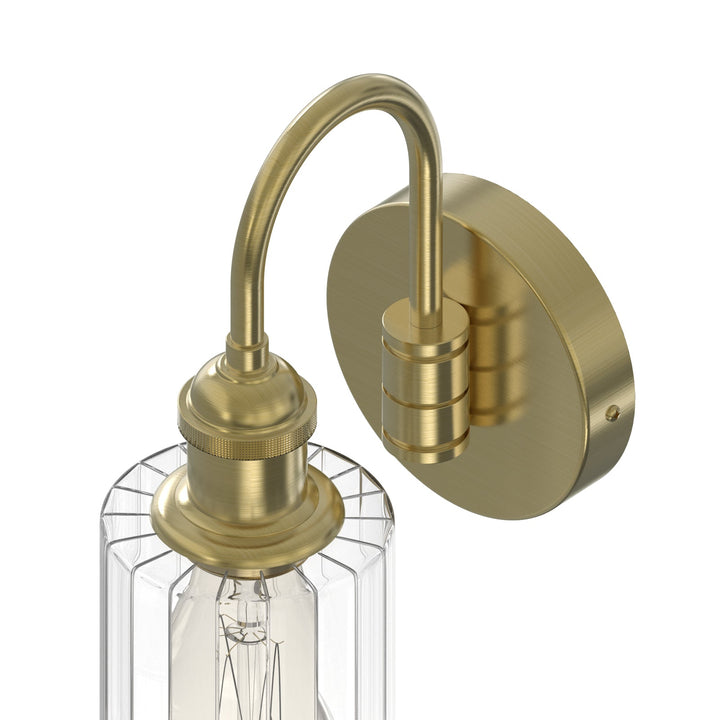 Modern glass wall light with metal frame, glass shade; E27 bulb holder; side profile; elegant design for interior spaces.