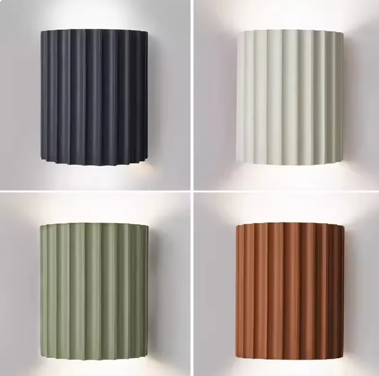 Modern resin wall lamp with artistic design, soft LED lighting, in white, green, grey, or orange for stylish home decor.