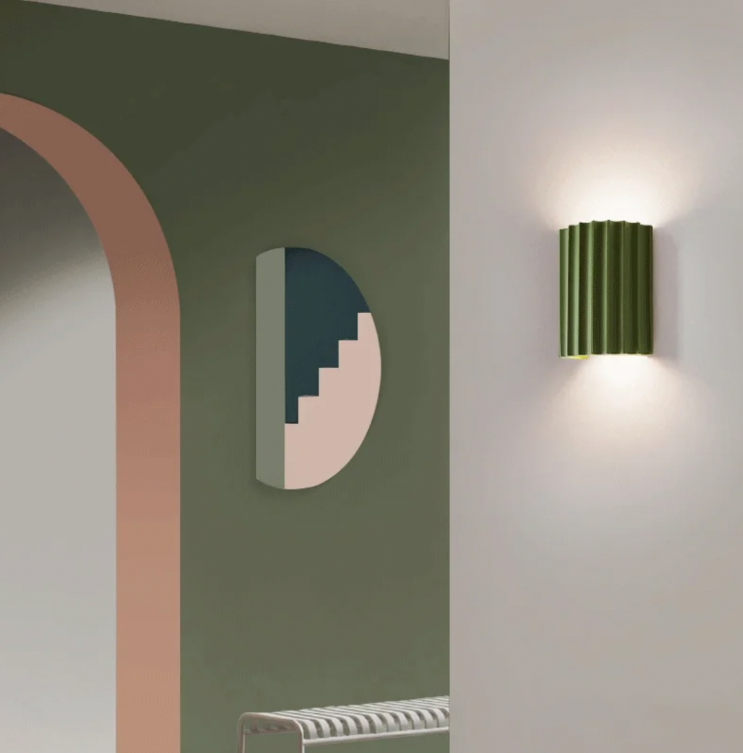 Modern resin wall lamp with artistic design, soft LED lighting, in white, green, grey, or orange for stylish home decor.