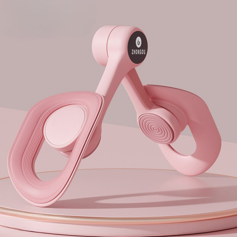 Pink adjustable pelvic and thigh trainer, compact design with digital counter, suitable for all fitness levels and portable.