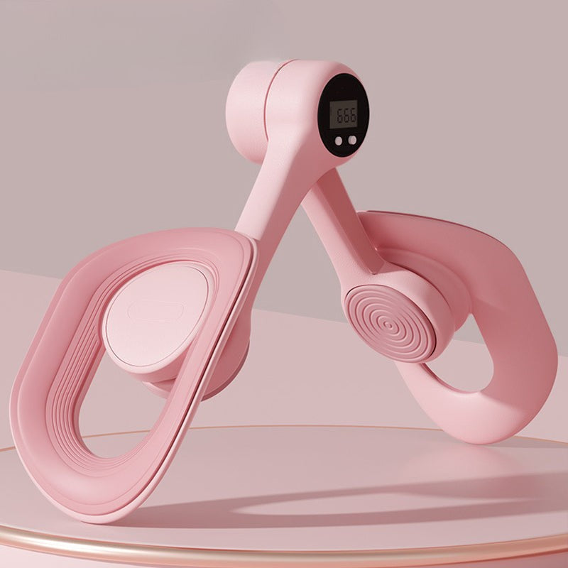 Pink adjustable pelvic and thigh trainer, compact design with digital counter, suitable for all fitness levels and portable.