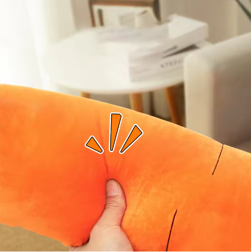 Plush carrot dog toy with soft orange fabric, green leafy top, durable squeaker; perfect for play and snuggles.