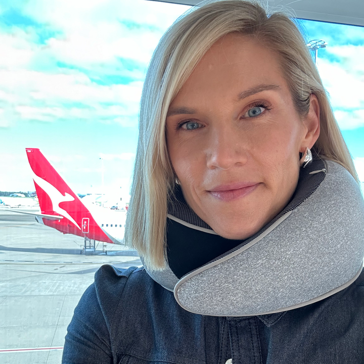 "Premium memory foam travel pillow, ergonomic neck support, sleek design, ideal for unisex comfort on-the-go."