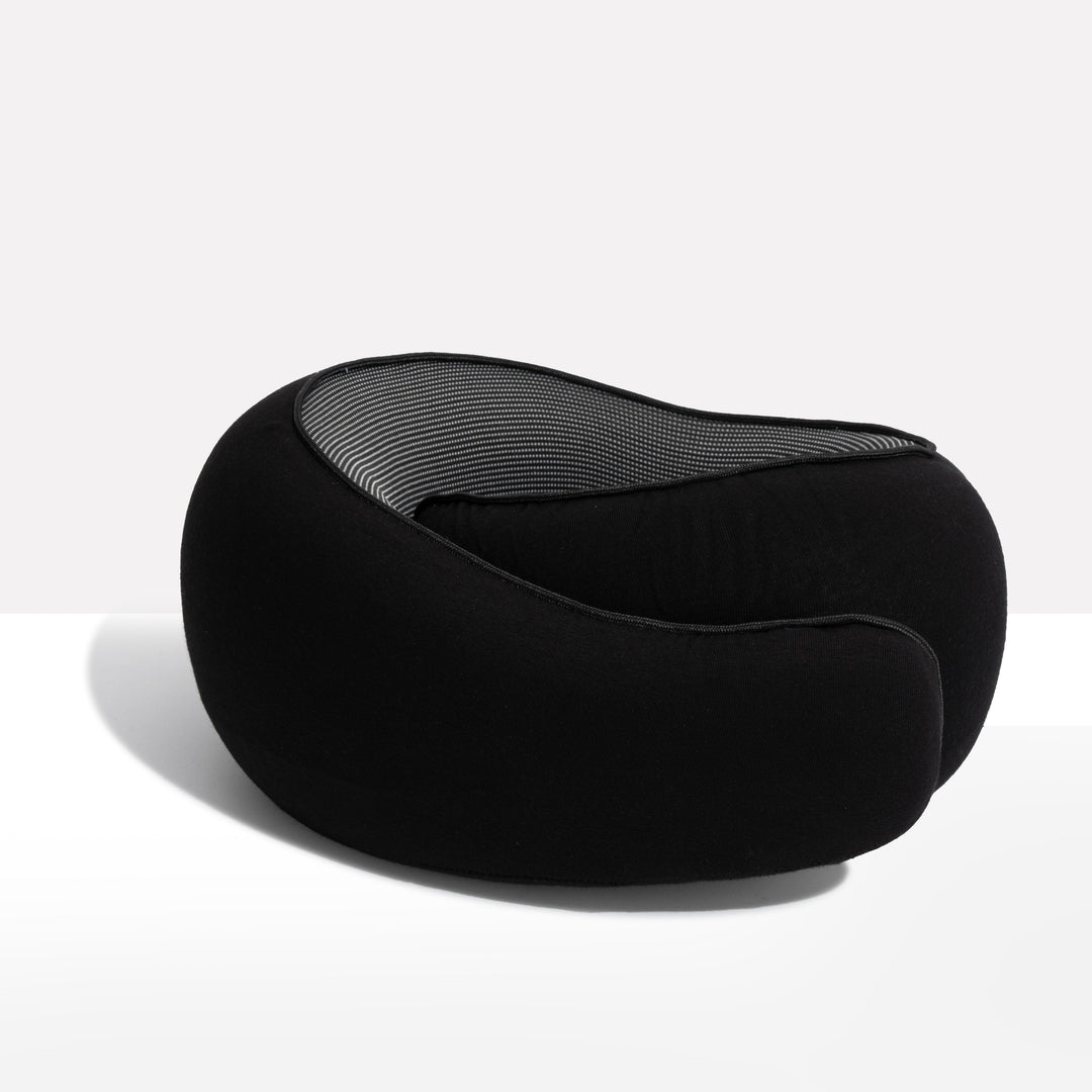 "Premium memory foam travel pillow, ergonomic neck support, sleek design, ideal for unisex comfort on-the-go."