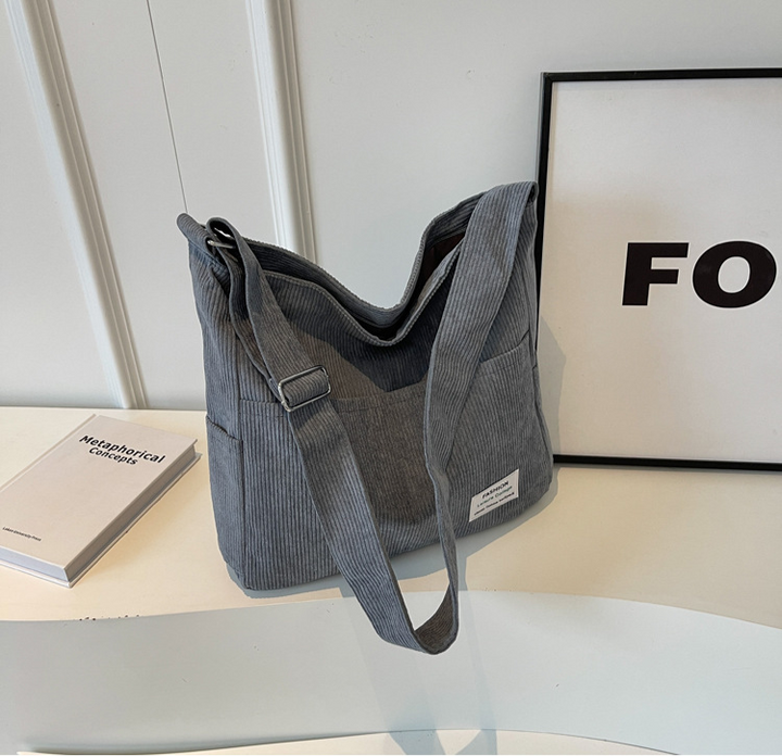 Ribbed velvet shoulder bag in beige, black, brown, green, grey with spacious interior for stylish, organized essentials.