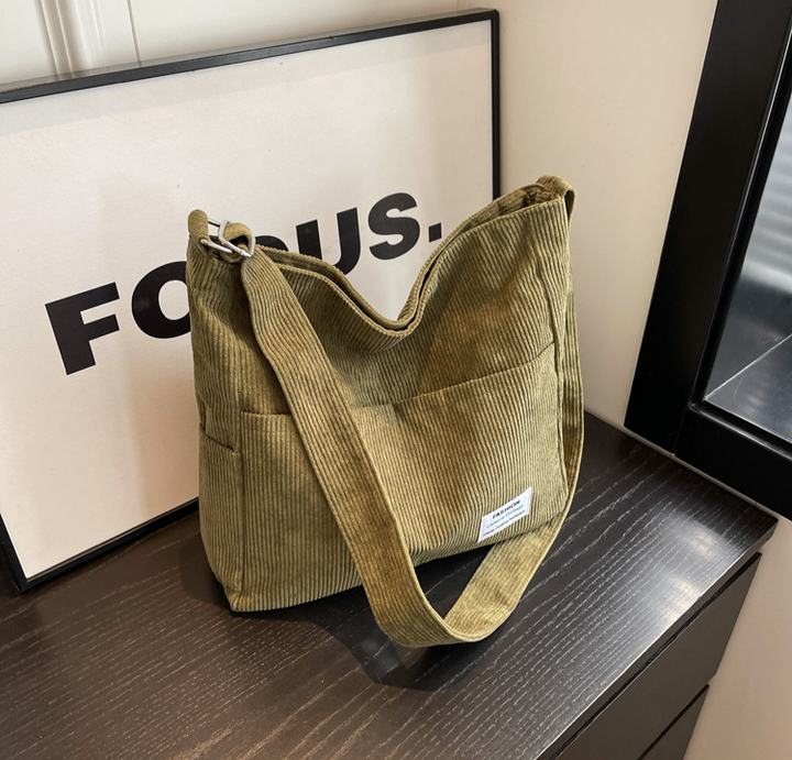 Ribbed velvet shoulder bag in beige, black, brown, green, grey with spacious interior for stylish, organized essentials.