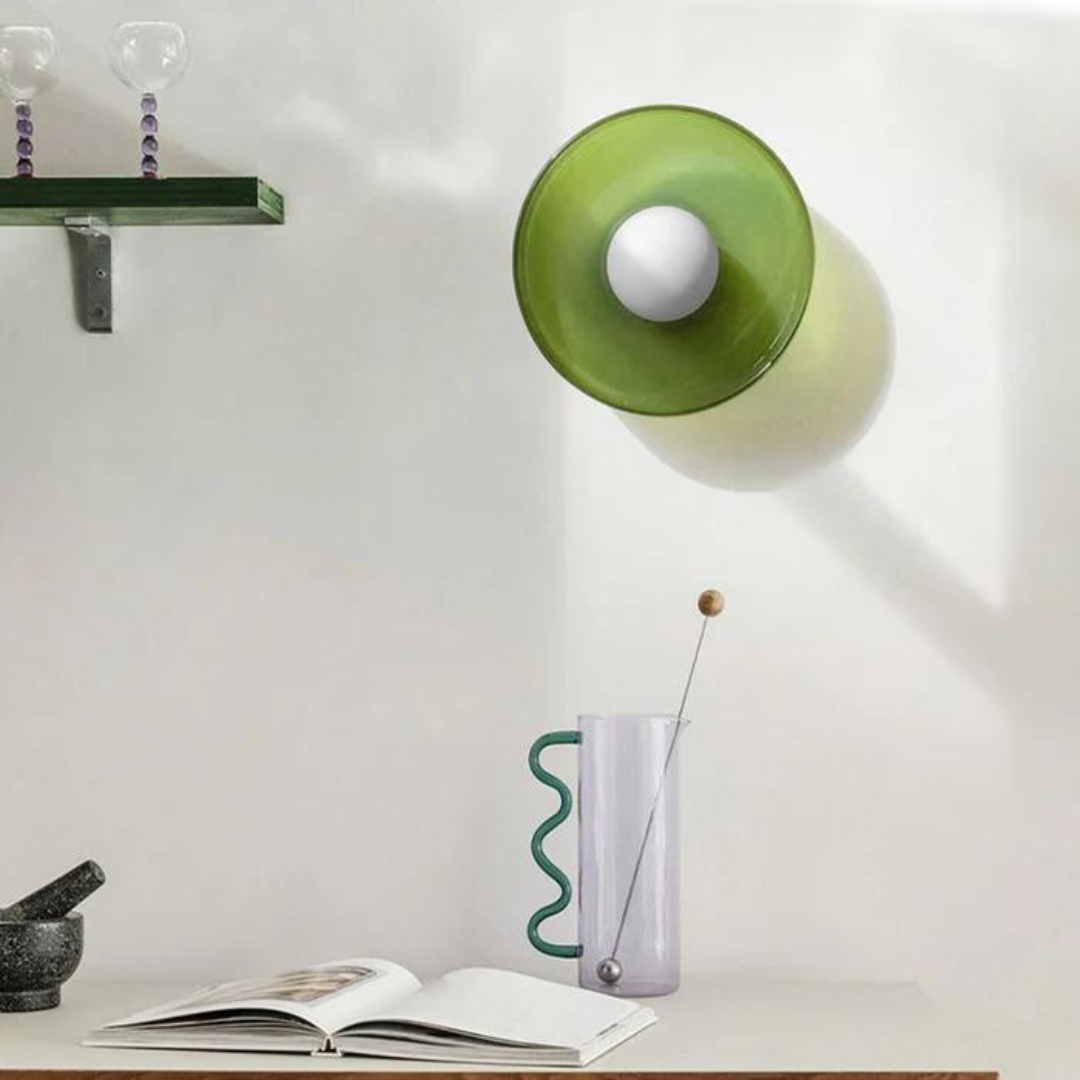 "Round ceiling lamp of high-quality glass in vibrant orange, stylish design, perfect for modern interiors, enhancing any spac