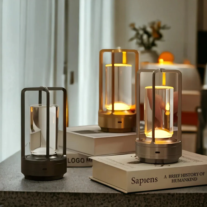 Scandinavian wireless LED table lamp with crystal-style shade and metal cage in black, gold, or silver for stylish interiors.