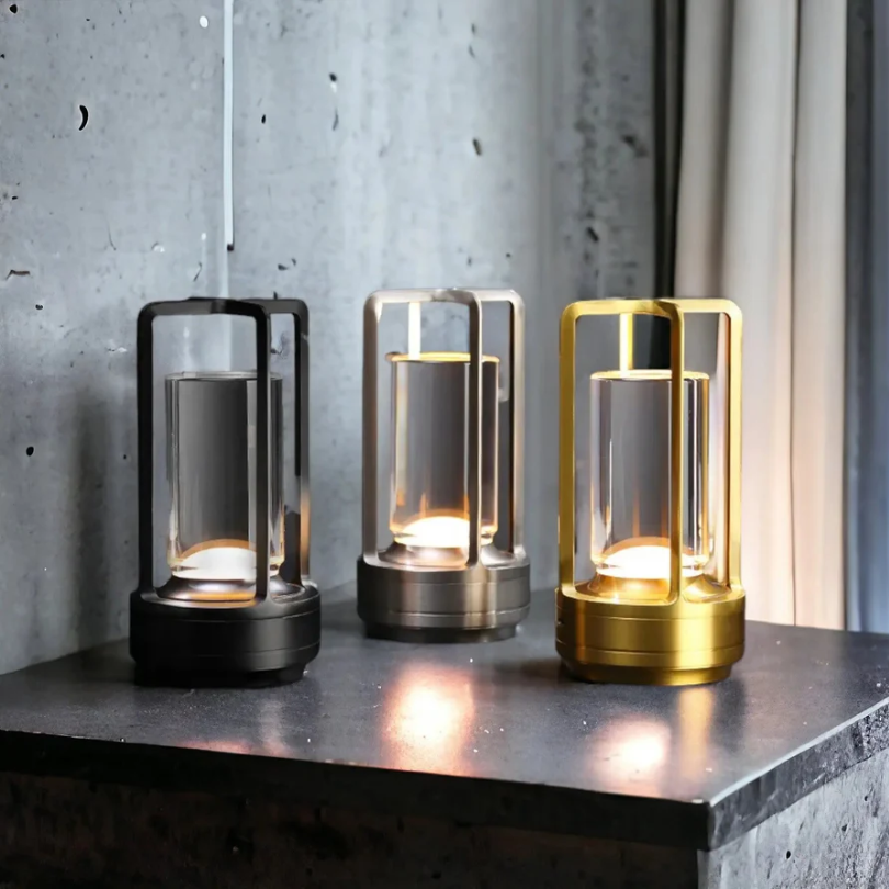 Scandinavian wireless LED table lamp with crystal-style shade and metal cage in black, gold, or silver for stylish interiors.