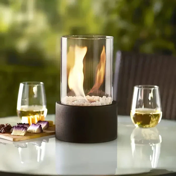 "Stylish portable table fire lantern with sleek design, soft flame flicker, steel and glass construction for cozy decor."