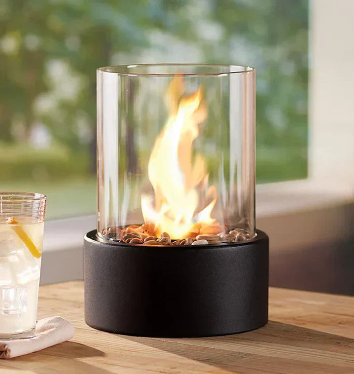 "Stylish portable table fire lantern with sleek design, soft flame flicker, steel and glass construction for cozy decor."
