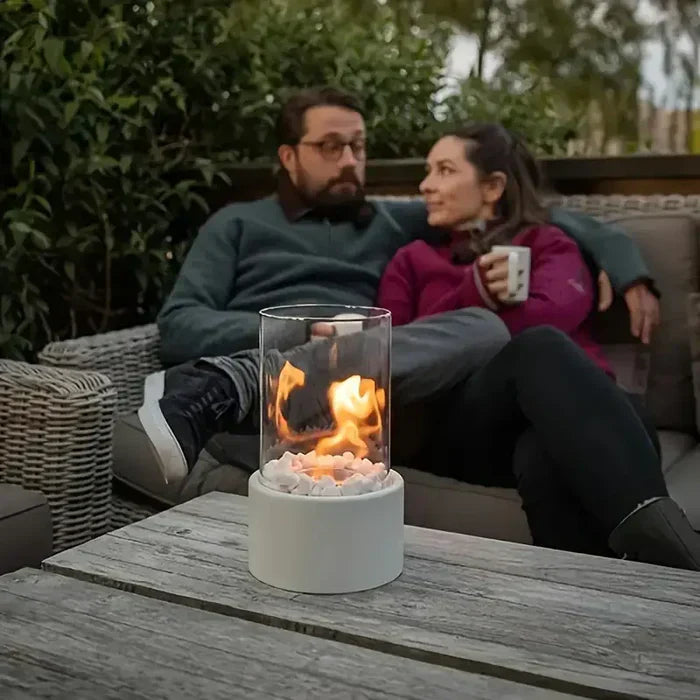 "Stylish portable table fire lantern with sleek design, soft flame flicker, steel and glass construction for cozy decor."