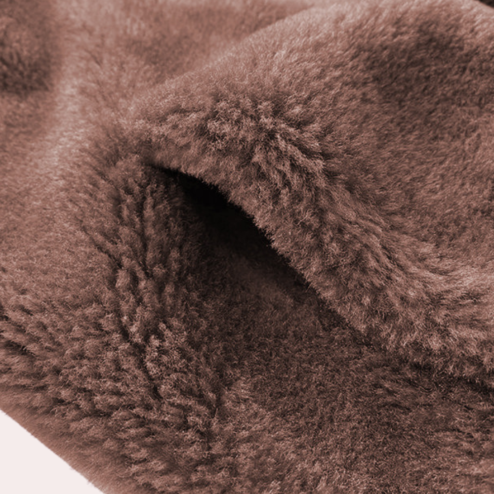 "Stylish women's warm jacket, grey, zip closure, premium polyester, elegant design, versatile fit for the chilly season."