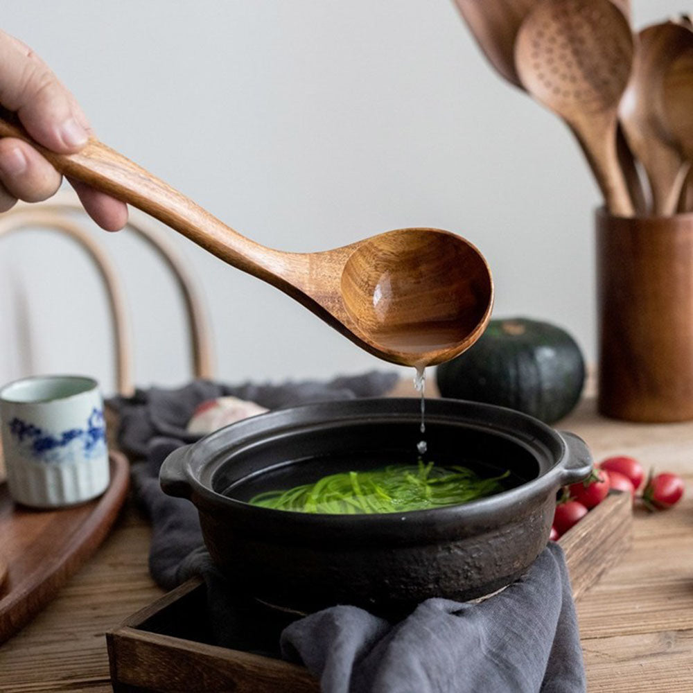 "Teak wood kitchen utensil set with non-scratch, polished finish; includes spoon, spatula, and colander, elegant design."