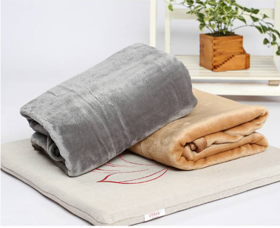 "Ultra-soft faux fur large sofa throw blanket in light grey, adding warmth and style to any living space, perfect for cozy de