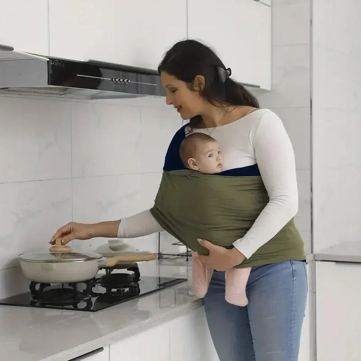 "Unisex ergonomic baby wrap carrier, grey, enveloping baby and parent comfortably for hands-free convenience."